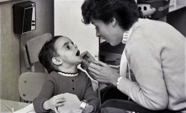 Children at Day Care at Glen Rush Campus Being Shown How to Brush by Seneca Dental Students
