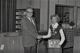 President Newnham Presenting Book to New Library
