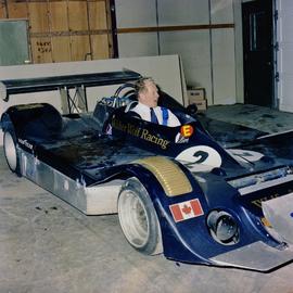 C.L. Plaxton in Race Car