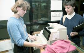 C2015-0001/025(19) - Pat Foster - Students Working in the Newnham Campus Boutique